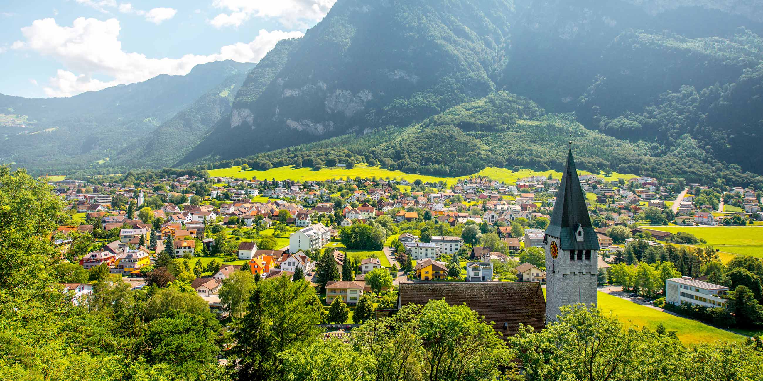 Liechtenstein Tour Packages Destination Guide Trafalgar US   Liechtenstein Balzers St Nicholas Church 616134082 Ge Nov2022 2600x1300 