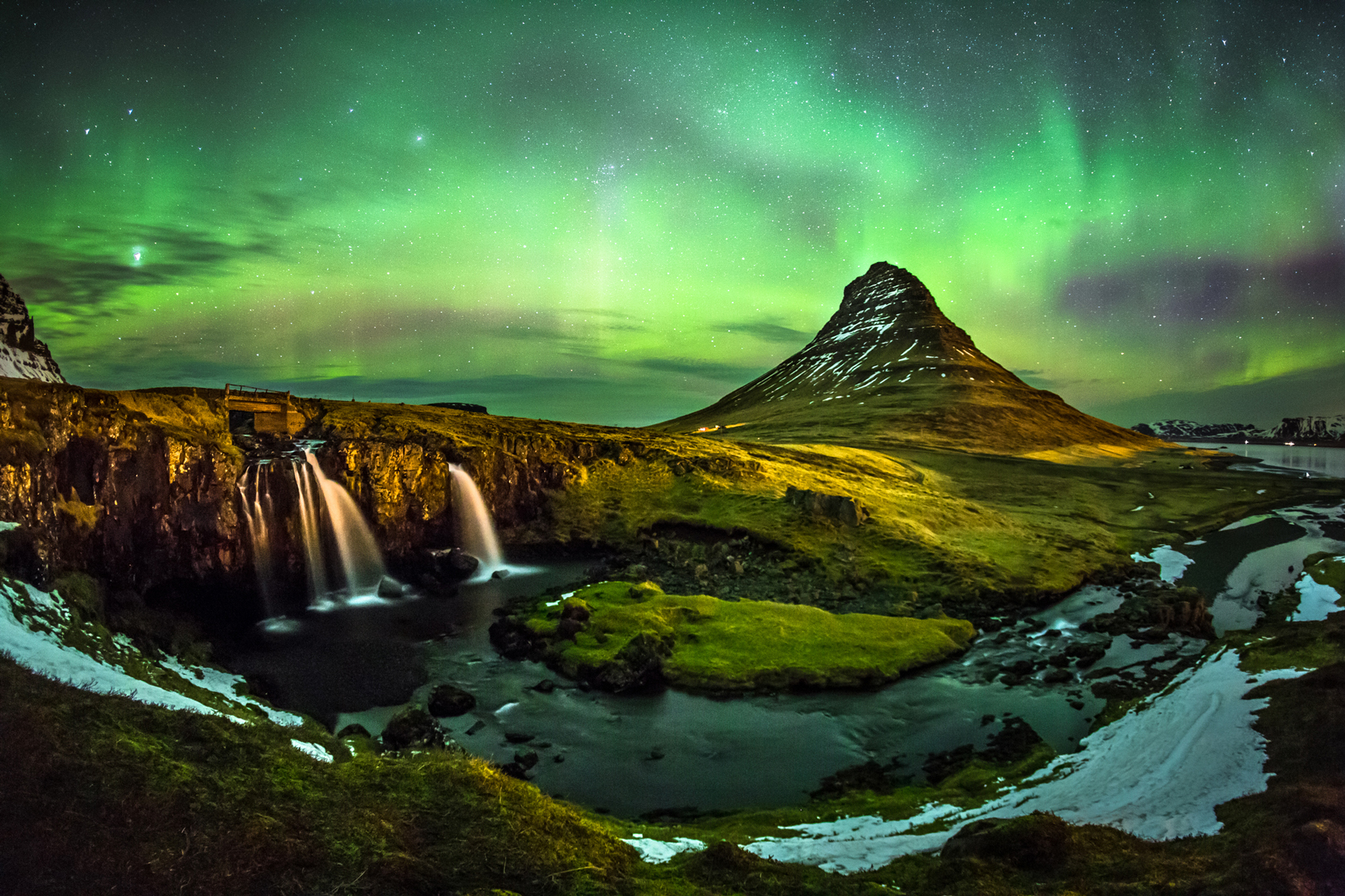 about The Northern Lights Aurora-Borealis-Mount-Kirkjufell-Iceland-www.istockphoto.com_gb_photo_aurora-borealis-at-mount-kirkjufell-iceland-gm480099052-68480955-SuppalakKlabdee