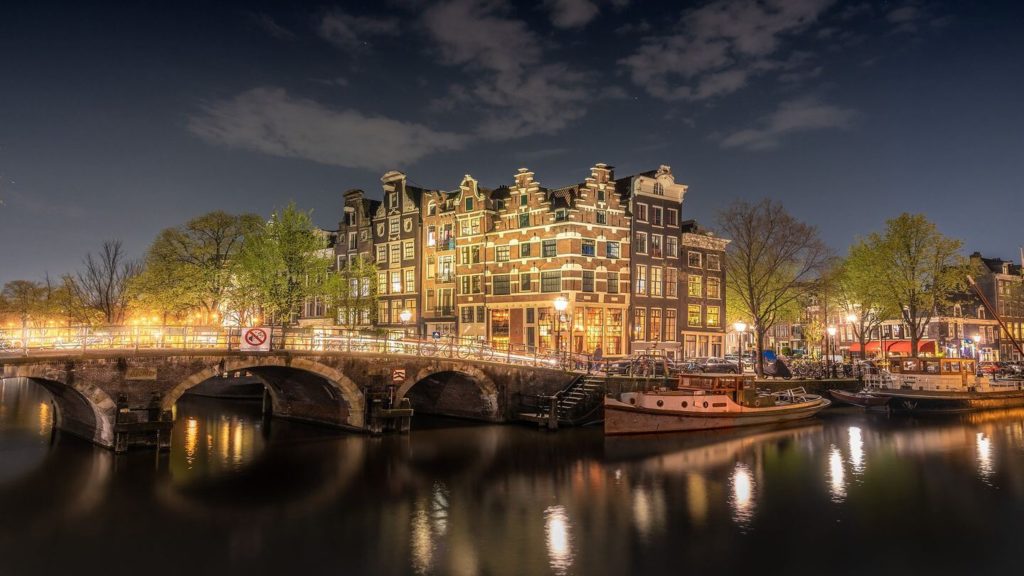 bridge illuminated night amsterdam netherlands