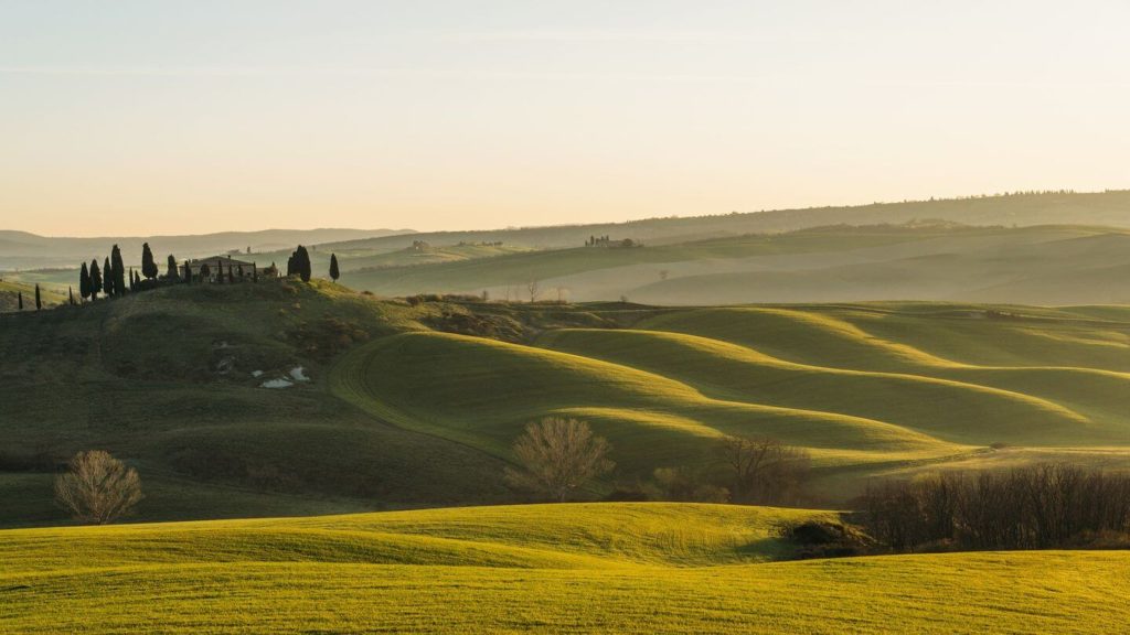 rolling green hills tuscany italy