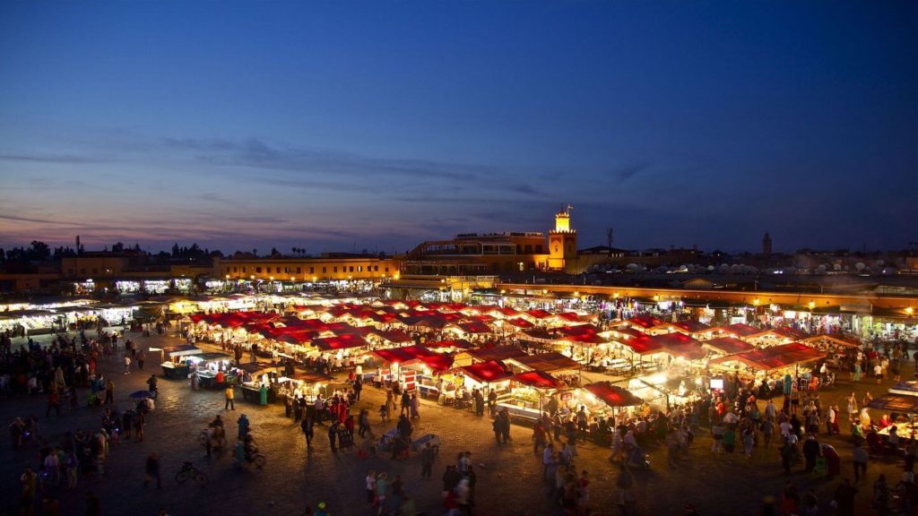 illuminated night market Marrakesh Morocco