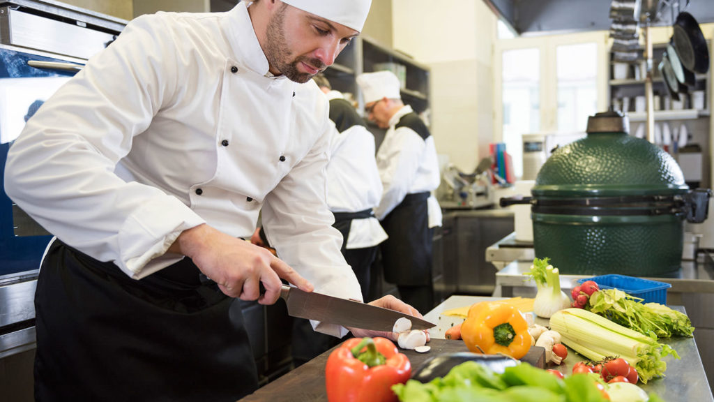 Chef showing knife skills at Vaduz restaurants, cafés and bars