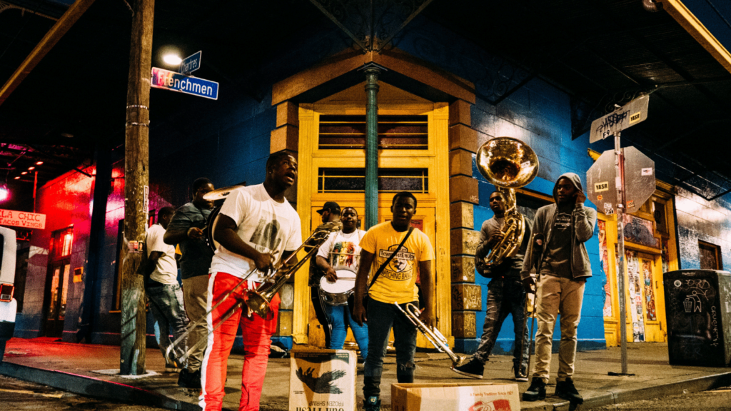 group of men playing brass instruments in New Orleans - restart travel deals