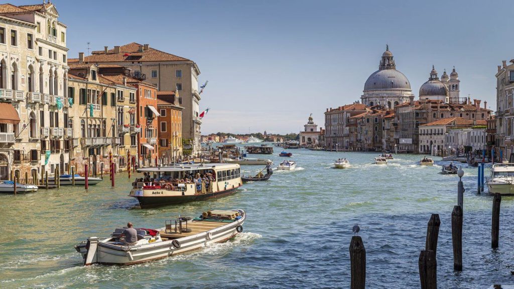 canal gondolas historic buildings Venice Italy