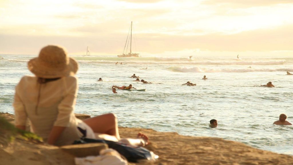 woman relaxing on the beach Hawaii