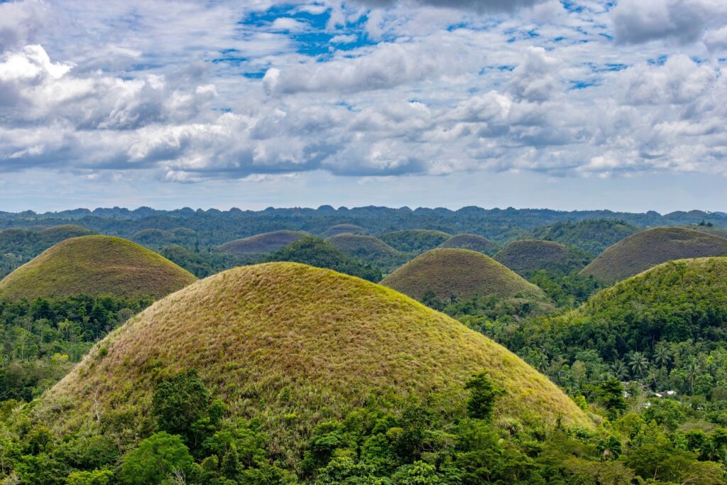 round forested Chocolate Hills in Bohol Philippines
