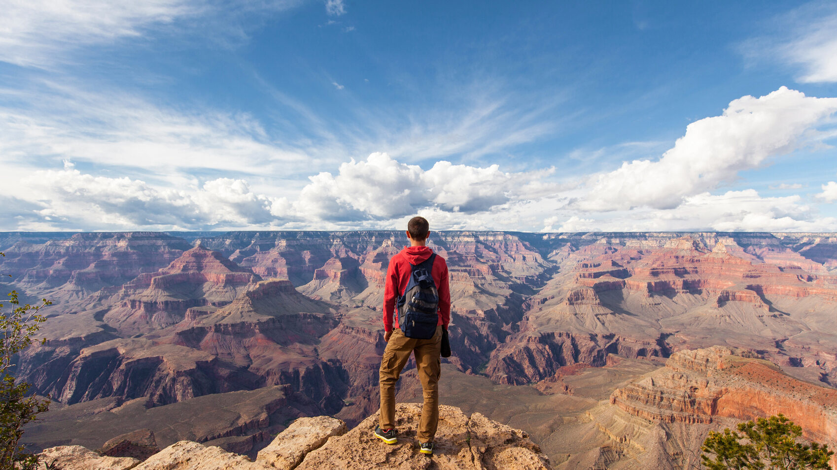 America's National Parks Grand-canyon-www.istockphoto.comgbphototravel-in-grand-canyon-man-hiker-with-backpack-enjoying-view-gm639133152-115027003-Nikolas_jkd